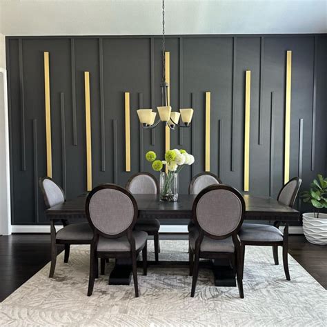 gold and black dining room|black dining room accent wall.